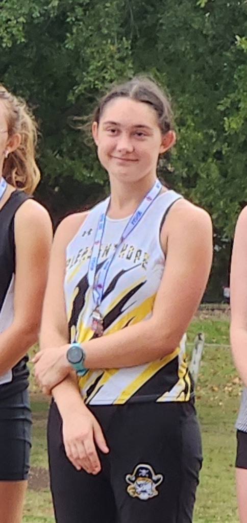 Makayla with her medal
