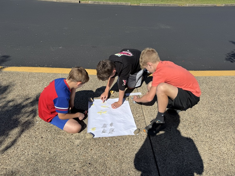 Mr. Jones’ Social Studies class stepped back in time to the Paleolithic Era by recreating cave paintings! Students explored how early humans expressed themselves through art and told stories on cave walls.