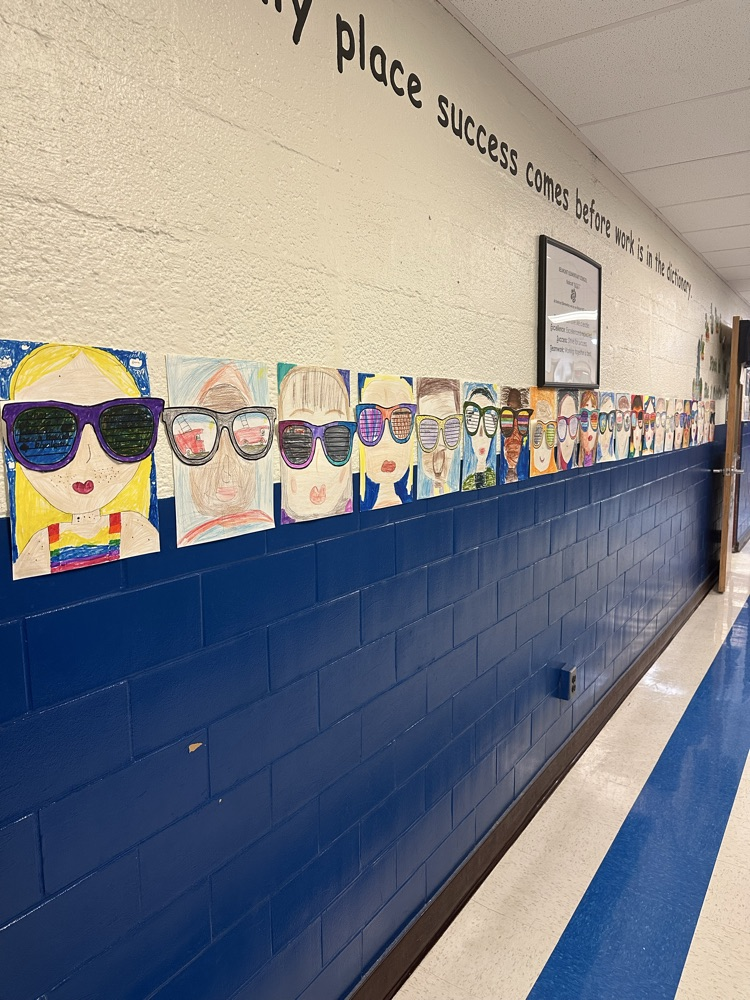 4th grade art in the hallway