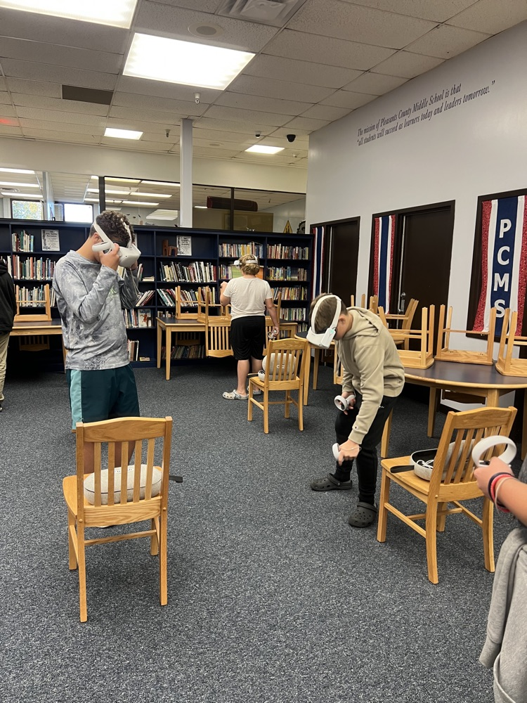 8th grade students using virtual reality headsets during a Workforce WV career exploration activity at PCMS.
