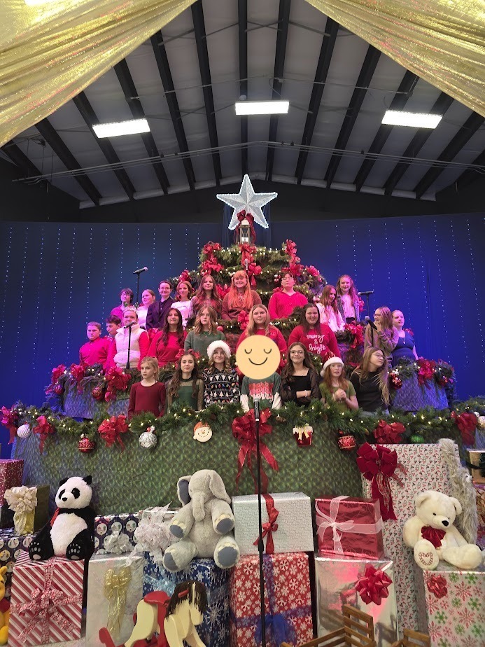 Choir students performing in the Singing Christmas Tree