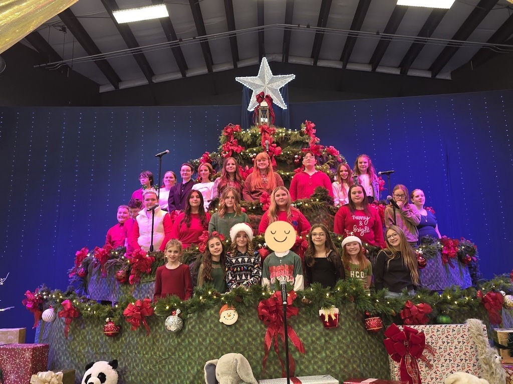 Choir students performing in the Singing Christmas Tree