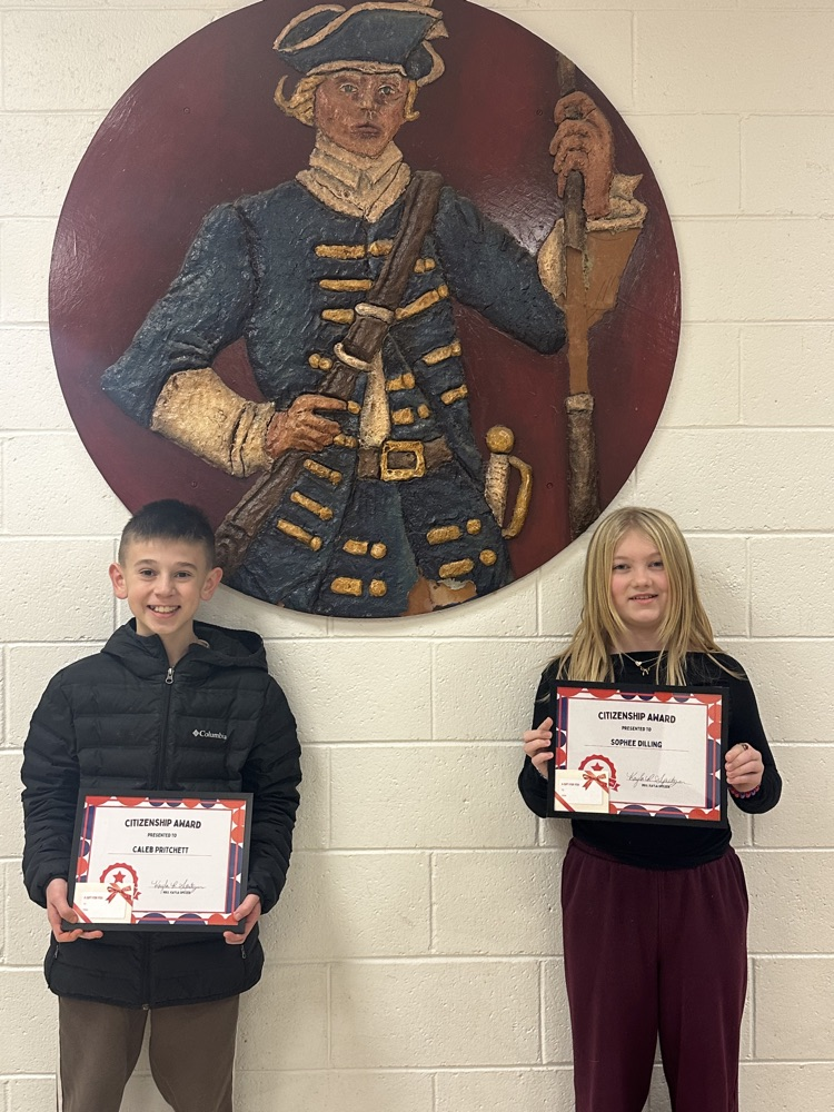 citizenship award winners holding certificate and gift card