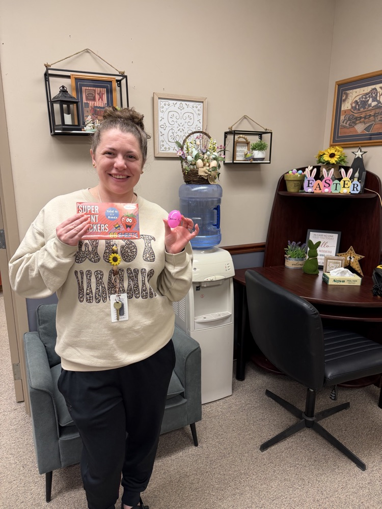 Kindness Week - Teacher holding gift