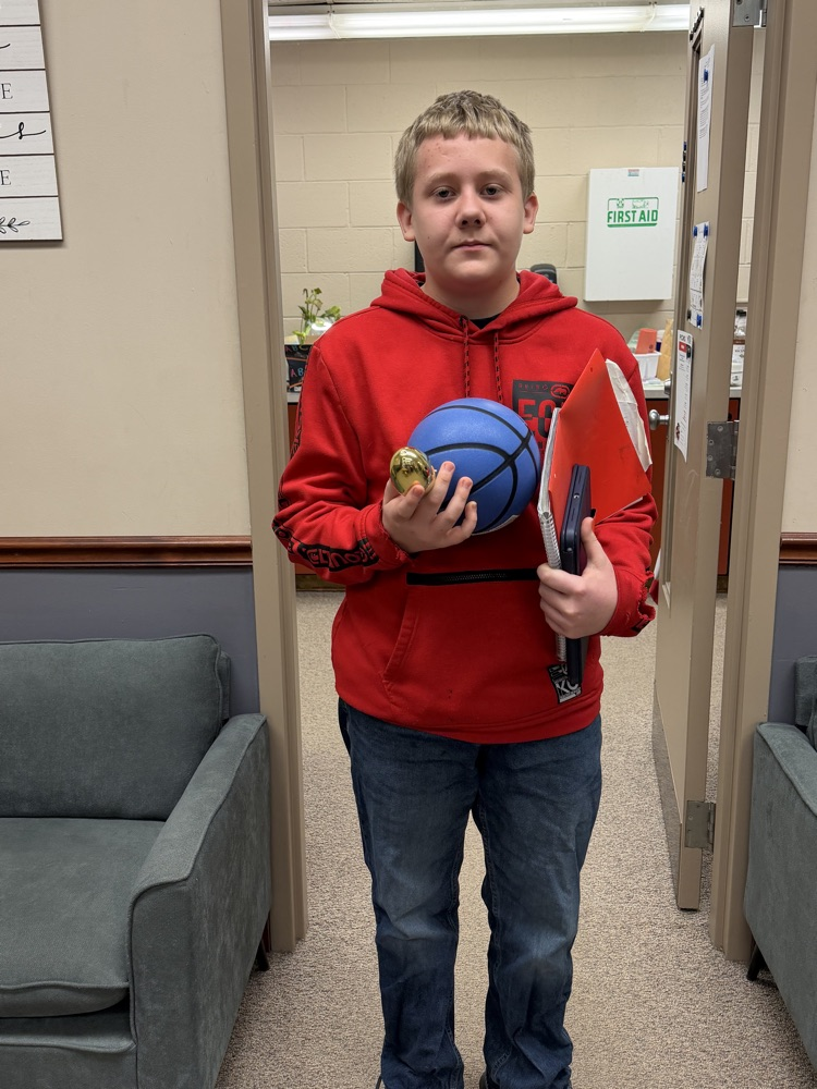 Kindness Week - Student holding gift