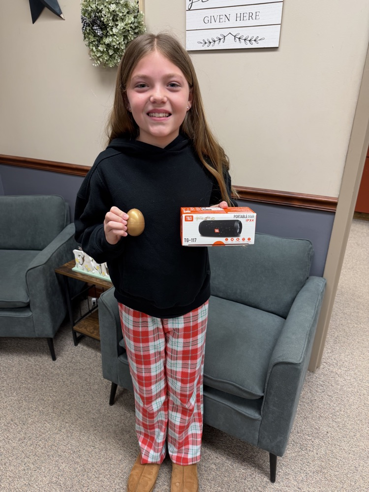 Kindness Week - Student holding gift
