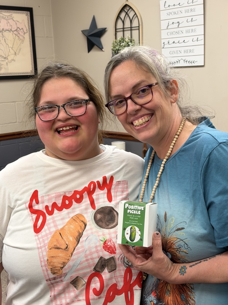 Kindness Week - Teacher holding gift