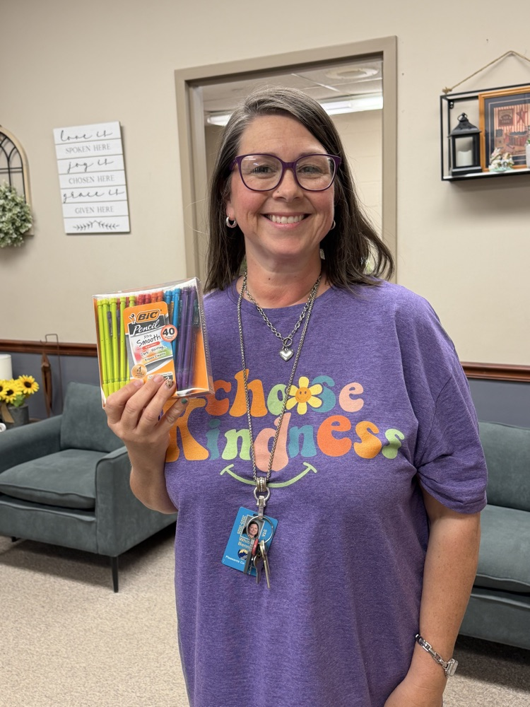 Kindness Week - Teacher holding gift