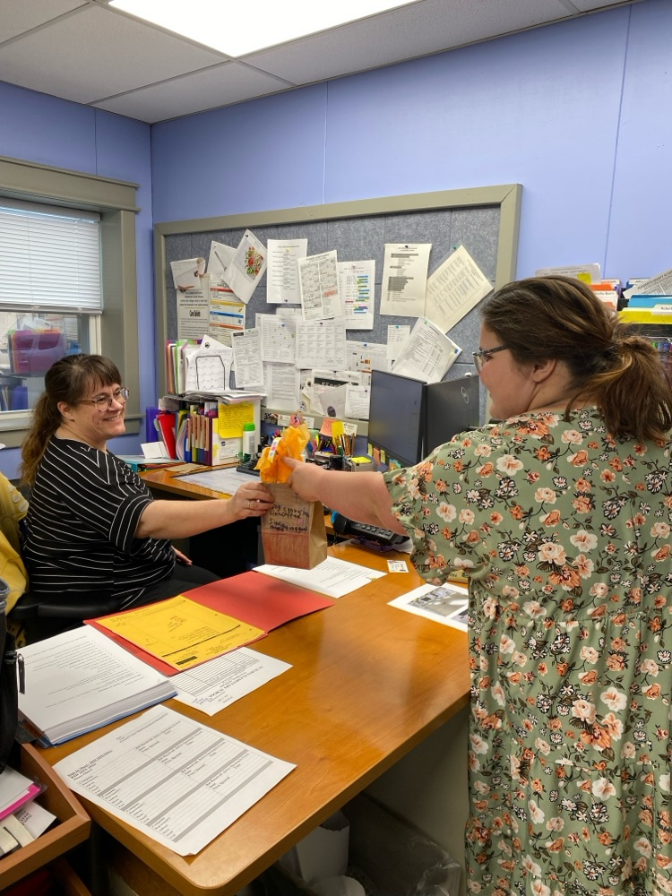 Kindness week cookie delivery, students handing out cookies to people in our community