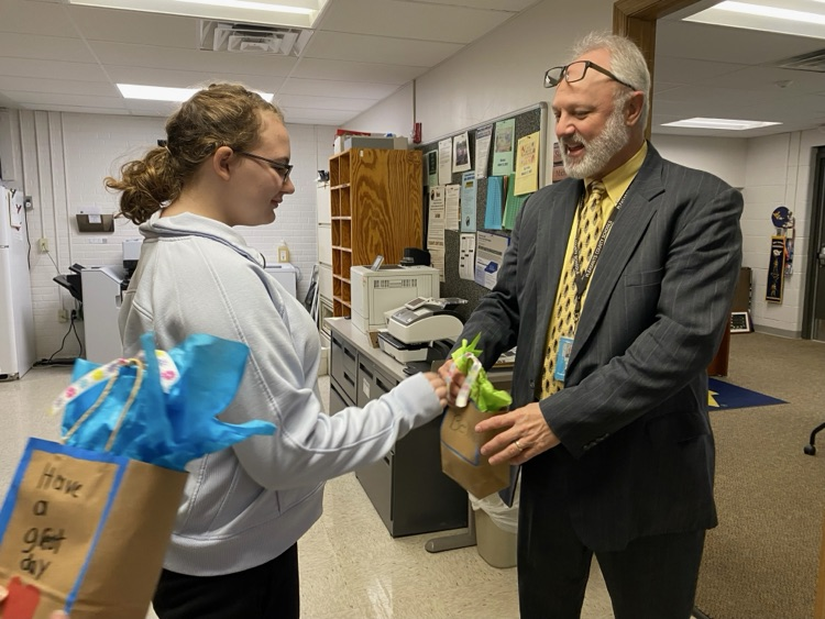 Kindness week cookie delivery, students handing out cookies to people in our community