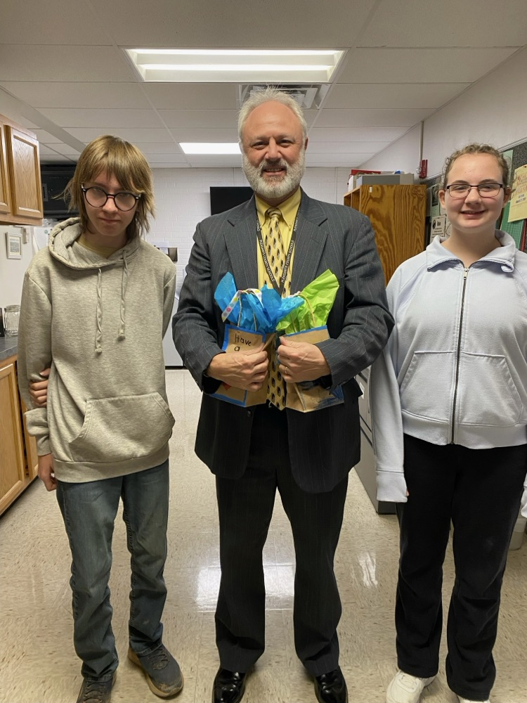 Kindness week cookie delivery, students handing out cookies to people in our community