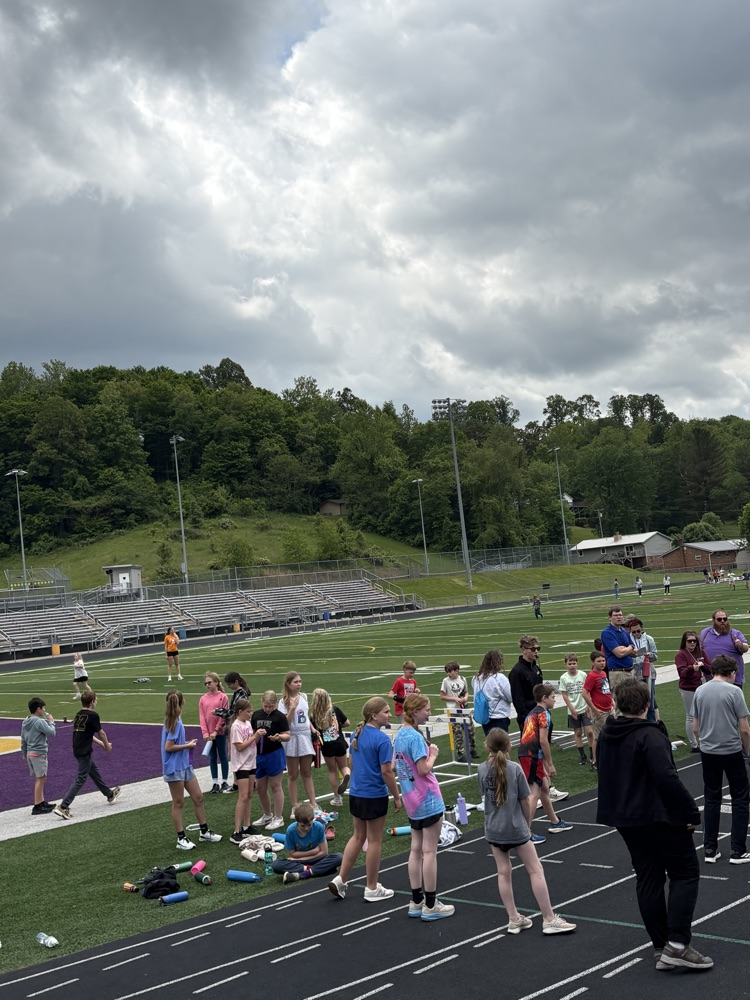 Fifth grade students participating in track and field events during Elementary Track & Field Day.
