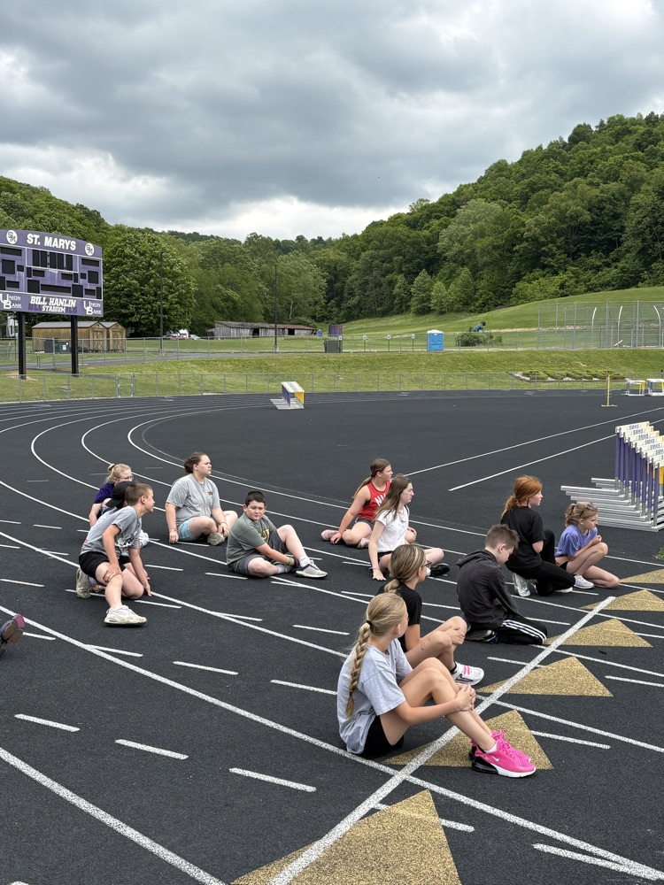 Fifth grade students participating in track and field events during Elementary Track & Field Day.