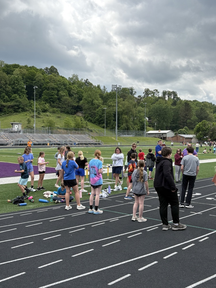 Fifth grade students participating in track and field events during Elementary Track & Field Day.
