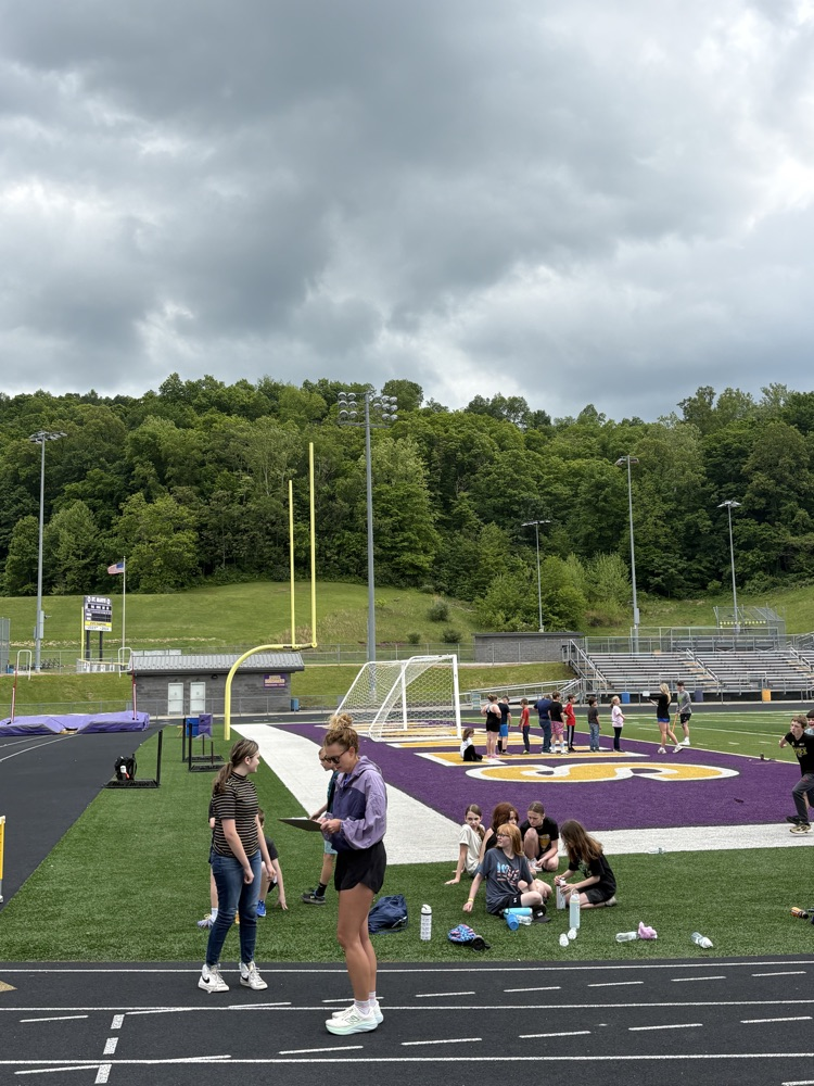 Fifth grade students participating in track and field events during Elementary Track & Field Day.