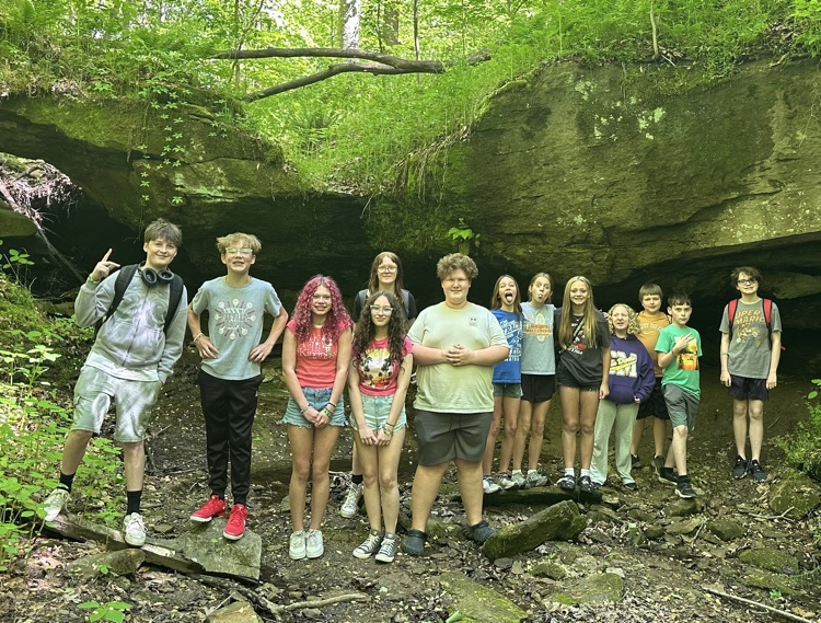 Seventh grade students explore exhibits and outdoor activities during a field trip to Deerassic Park Education Center in Ohio.