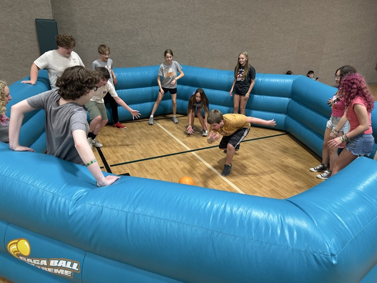 Seventh grade students explore exhibits and outdoor activities during a field trip to Deerassic Park Education Center in Ohio.