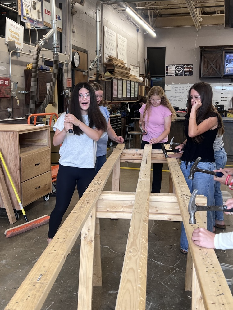 Eighth grade students touring St. Marys High School and MOVTI while learning about high school classes and career programs.