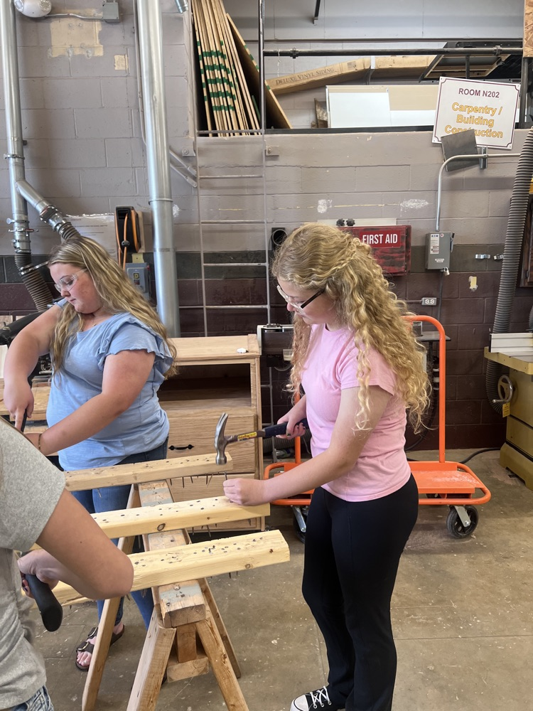Eighth grade students touring St. Marys High School and MOVTI while learning about high school classes and career programs.