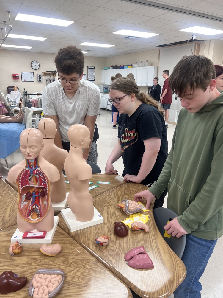 Eighth grade students touring St. Marys High School and MOVTI while learning about high school classes and career programs.
