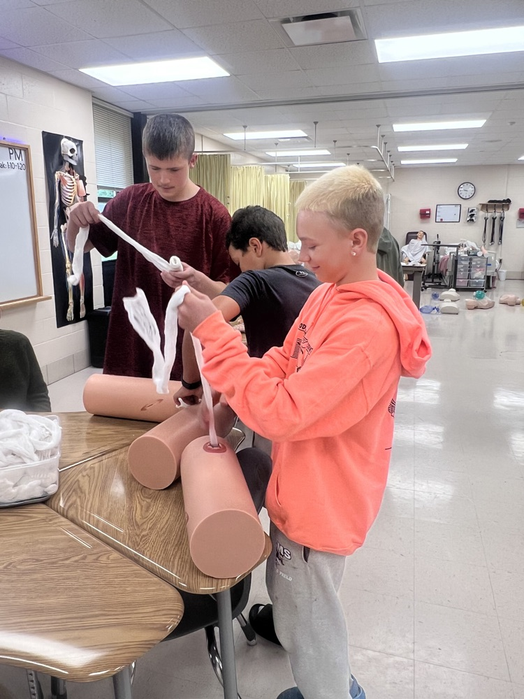 Eighth grade students touring St. Marys High School and MOVTI while learning about high school classes and career programs.