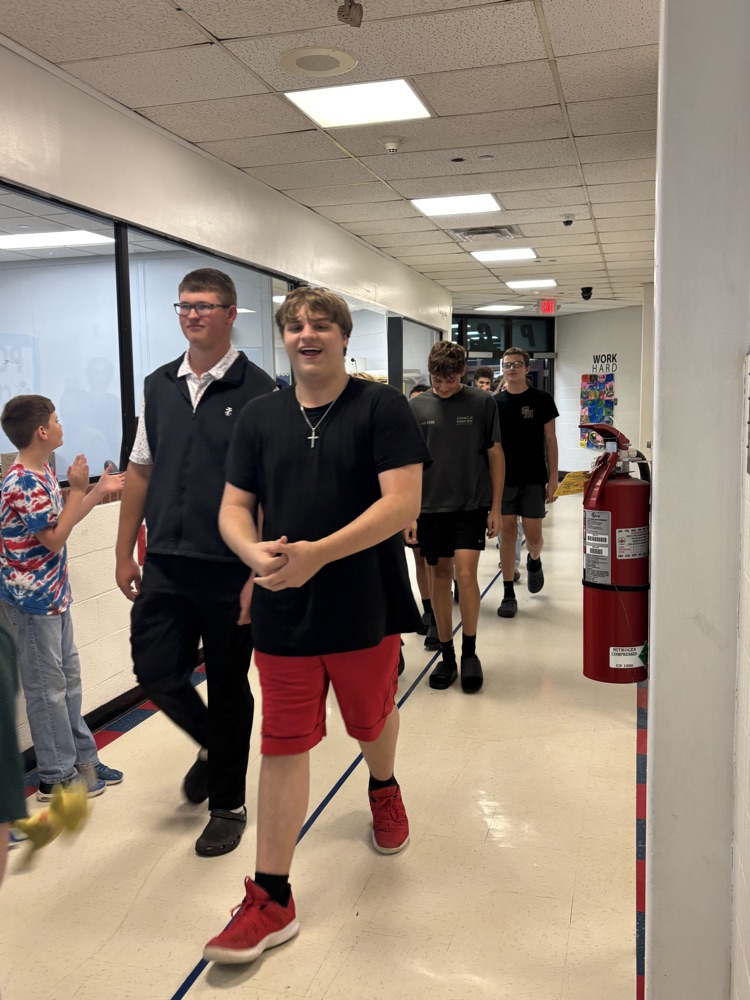 PCMS 8th grade students take their final lap through the school as students and staff line the hallways to cheer them on and celebrate their transition to high school.