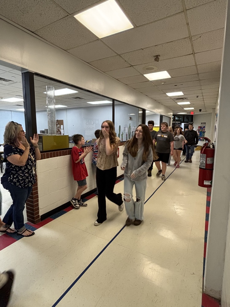 PCMS 8th grade students take their final lap through the school as students and staff line the hallways to cheer them on and celebrate their transition to high school.