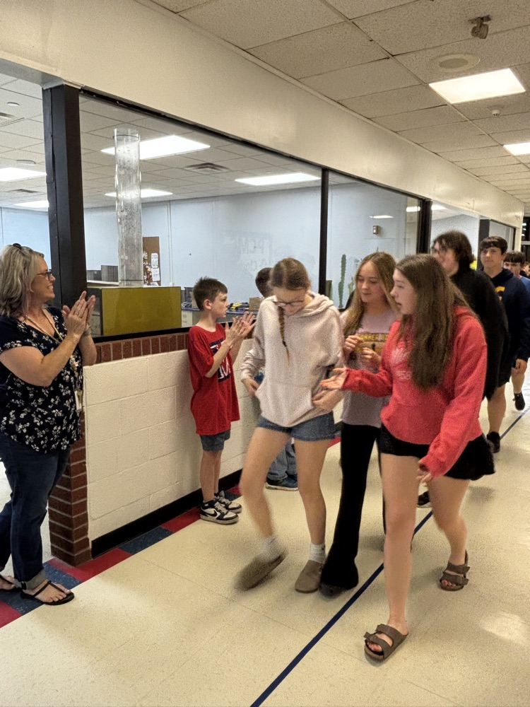 PCMS 8th grade students take their final lap through the school as students and staff line the hallways to cheer them on and celebrate their transition to high school.