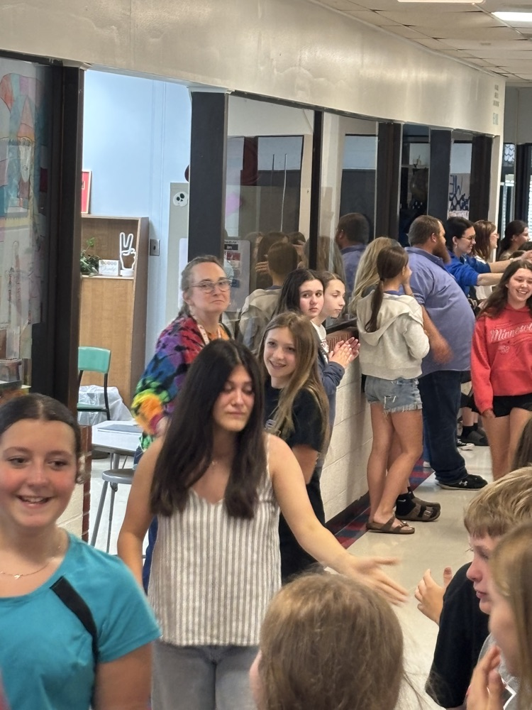 PCMS 8th grade students take their final lap through the school as students and staff line the hallways to cheer them on and celebrate their transition to high school.