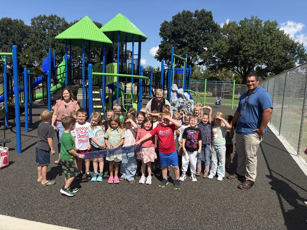 Photos from the ribbon-cutting celebration at Belmont Elementary School for the new Pre-K and Kindergarten–4th Grade playgrounds. Students are pictured exploring and enjoying the new playground equipment with excitement and smiles. The celebration highlights the new playgrounds and the community support that helped make the project possible.