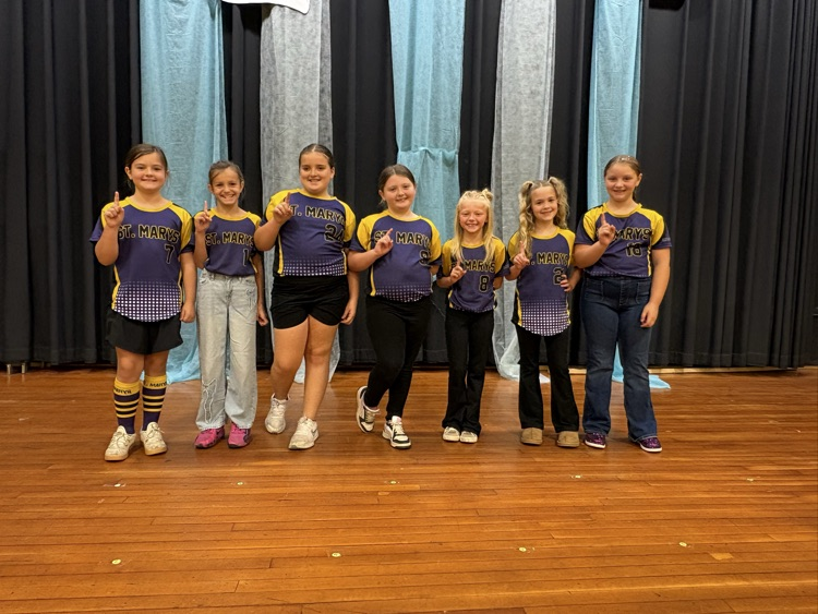 8U softball players from Belmont Elementary School celebrated their undefeated 12-0 regular season during a BES morning meeting.