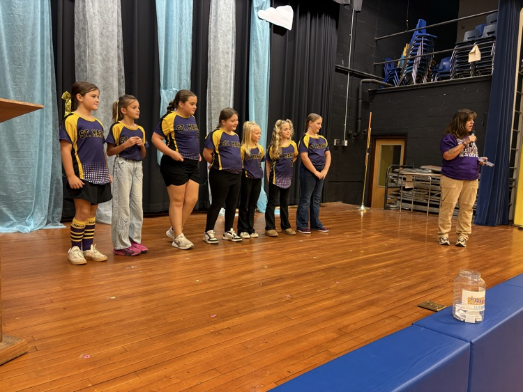 8U softball players from Belmont Elementary School celebrated their undefeated 12-0 regular season during a BES morning meeting.