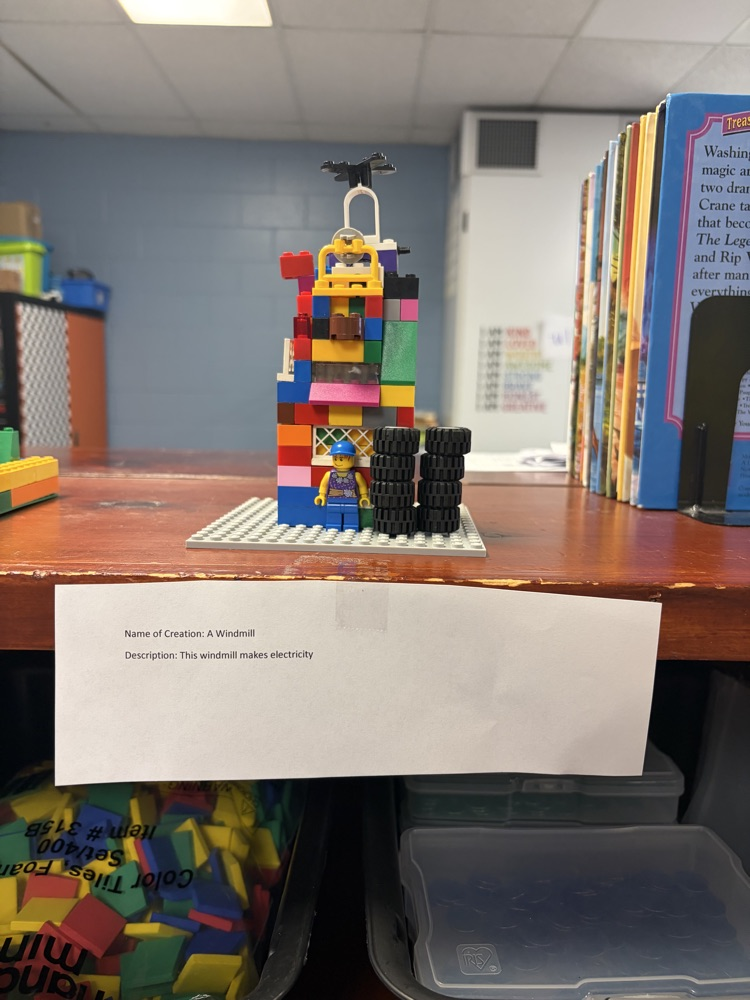 Fourth-grade students complete a mystery LEGO STEAM challenge, building unique creations and competing in a student-voted display.