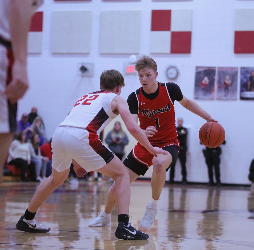 student with basketball