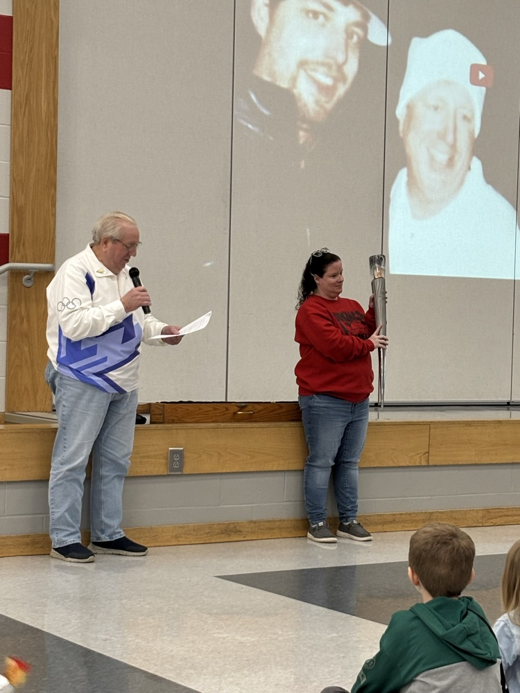 Mr parsons describes carrying the Olympic torch to students