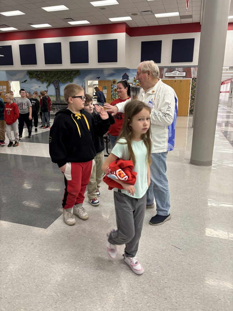Mr parsons describes carrying the Olympic torch to students