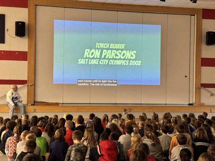 Mr parsons describes carrying the Olympic torch to students