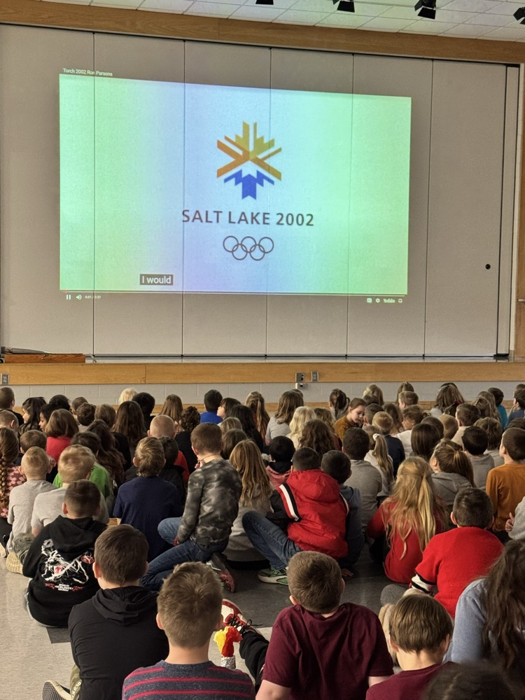 Mr parsons describes carrying the Olympic torch to students