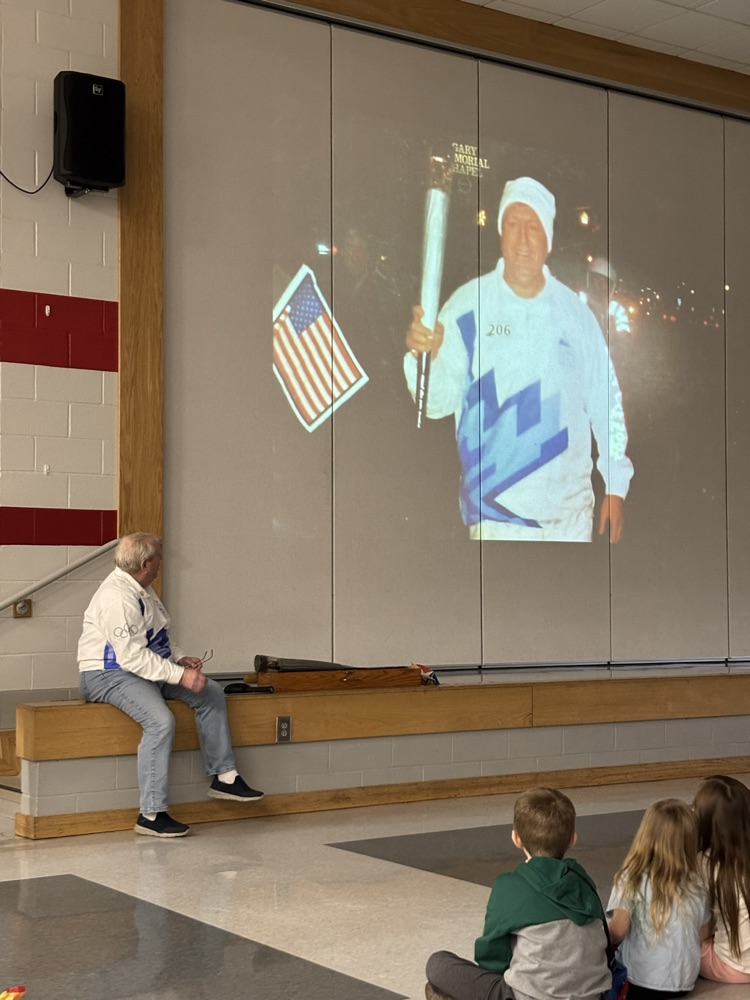 Mr parsons describes carrying the Olympic torch to students
