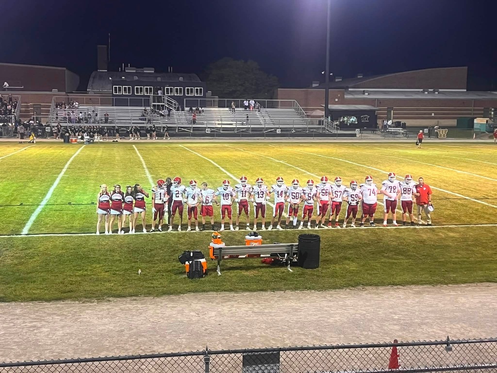 cheerleaders and football players