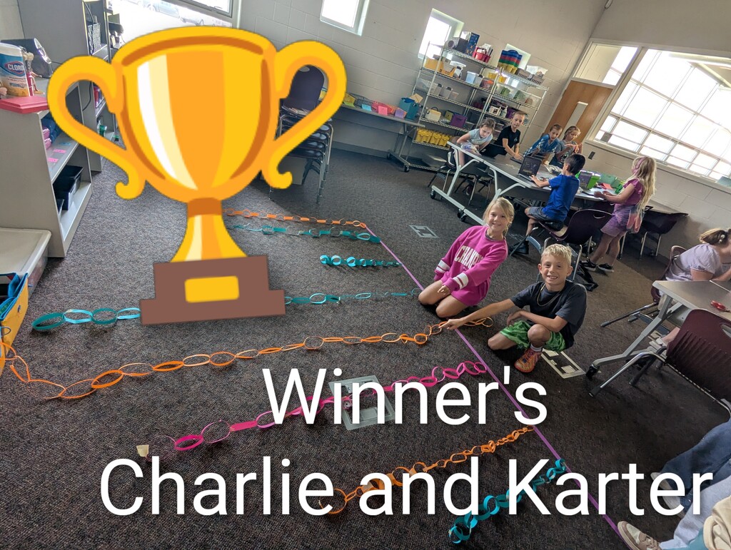 students making paper chain in computer class