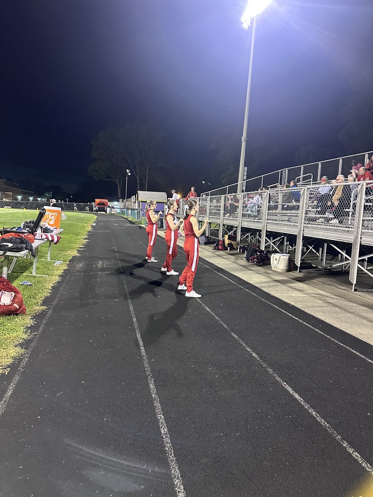 football cheer, players and band
