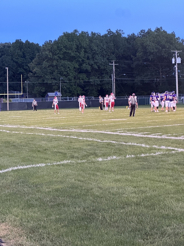 football cheer, players and band