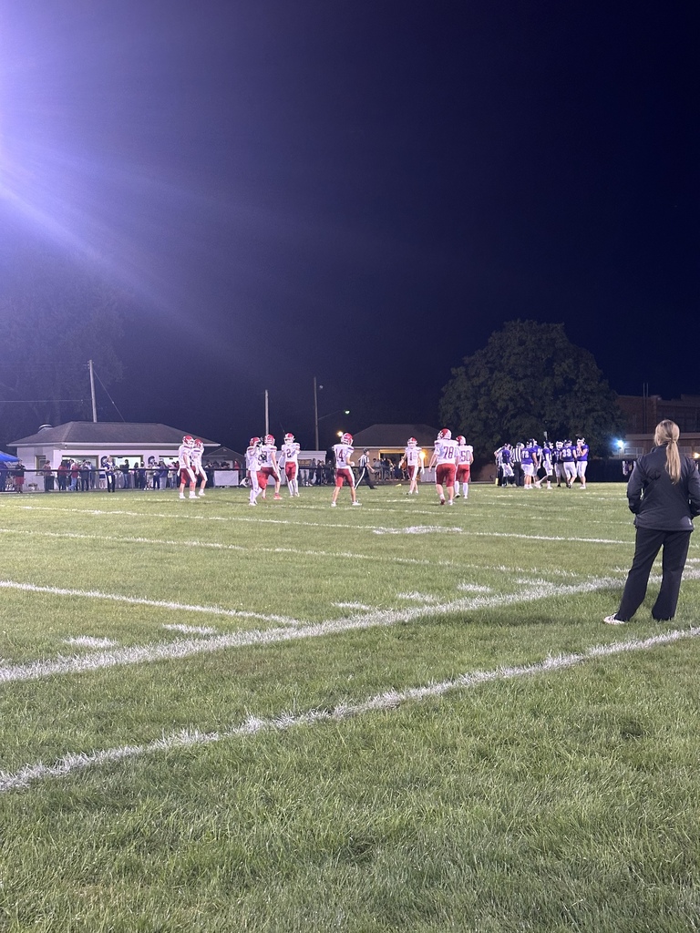 football cheer, players and band