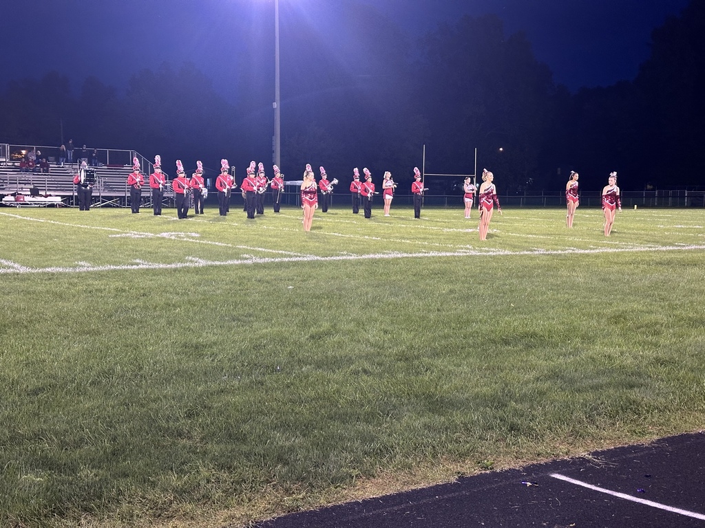 football cheer, players and band