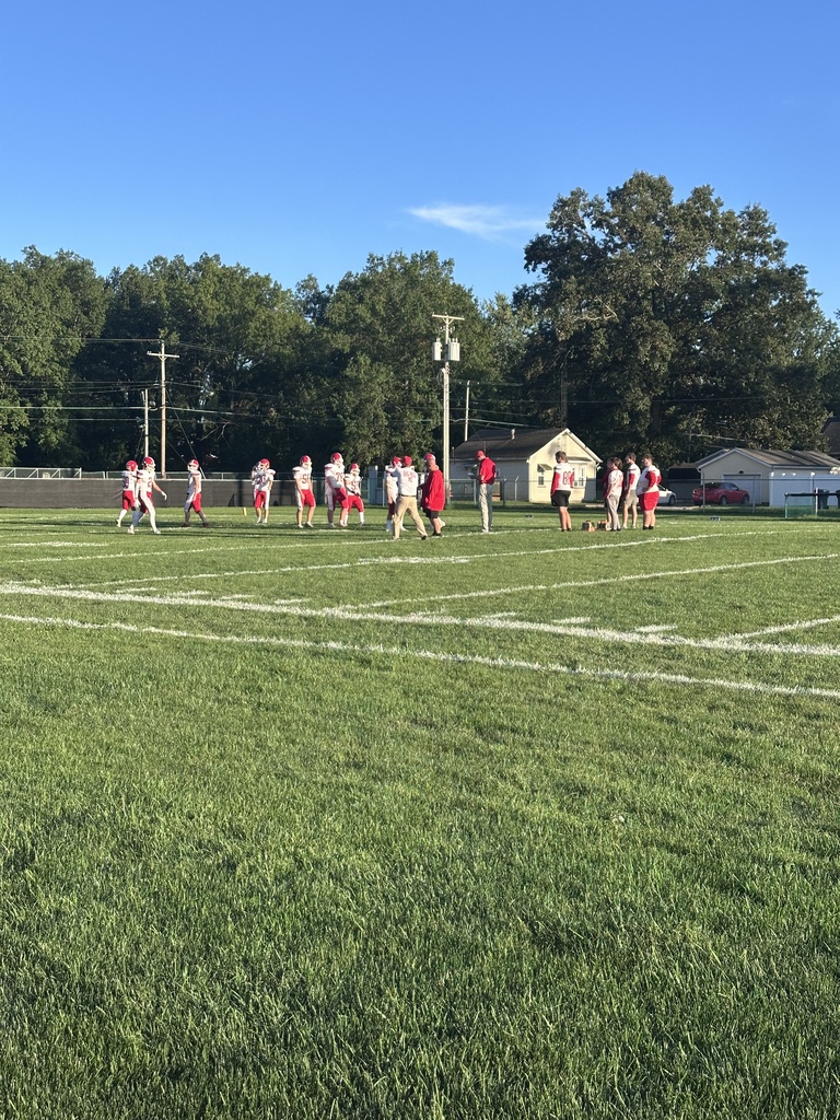 football cheer, players and band