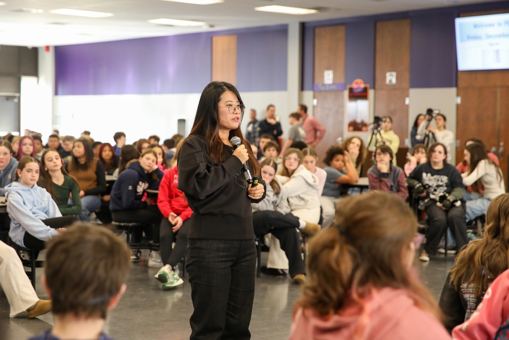 Grace Jo speaks to seventh graders at PCIS.