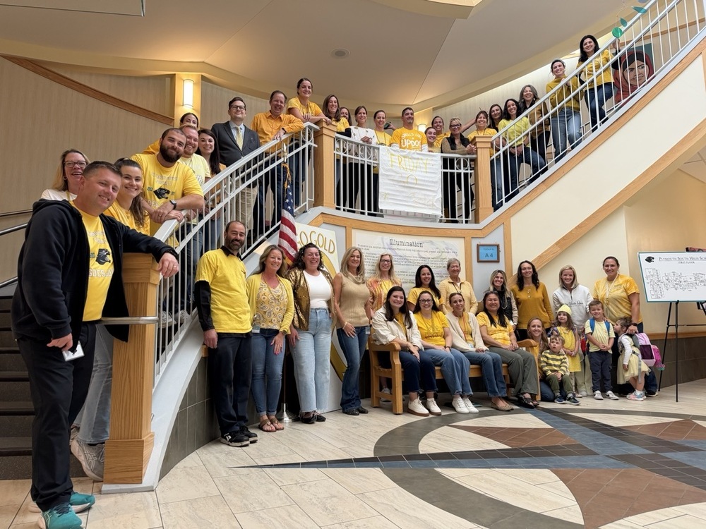Staff wear gold for childhood cancer.