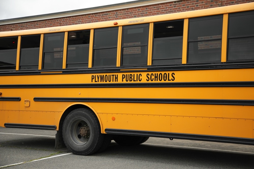 Plymouth Public Schools yellow school bus.