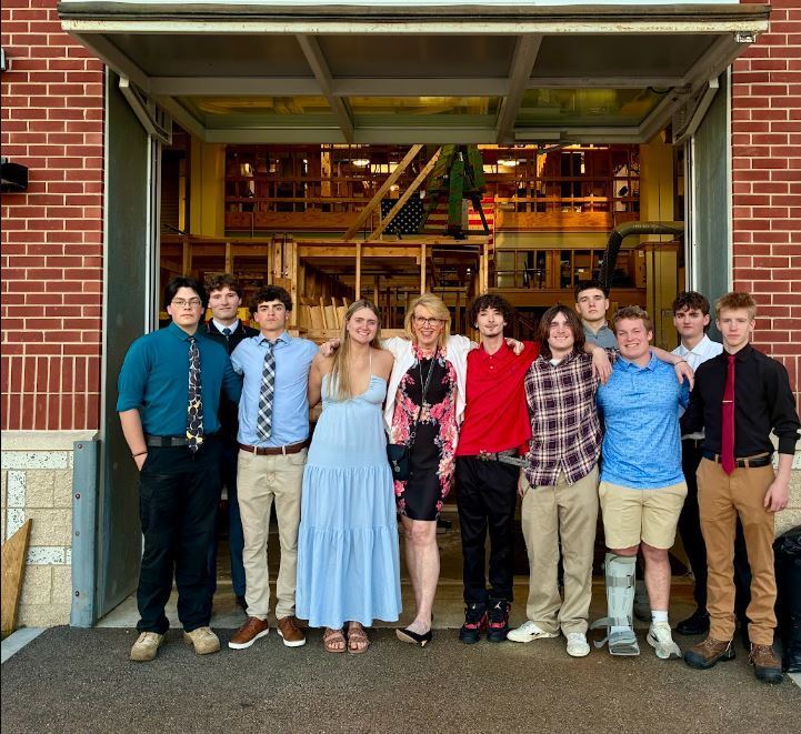 photo of plumbing students and instructor